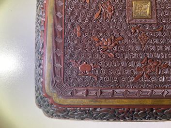 A pair of Chinese black and red cinnabar lacquer square dishes, Qianlong mark and of the period